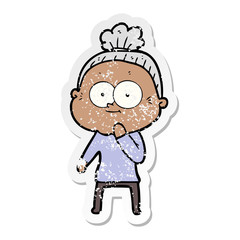 distressed sticker of a cartoon happy old woman