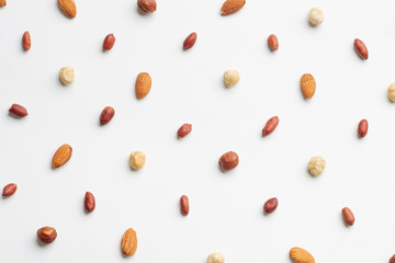 Composition of nuts pattern on white background