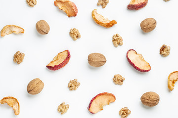 Composition of nuts pattern on white background
