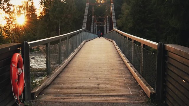 old wooden bridge in the forest in Norway 