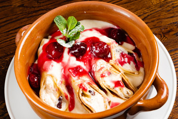 crepes with cottage cheese and berry sauce