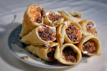 baked sweets with cream