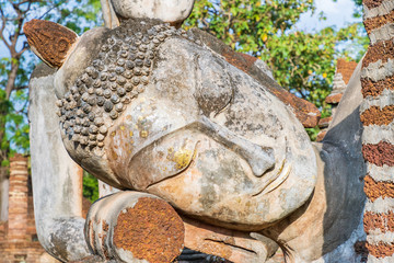 Reclining Buddha statue at Wat Phra Kaeo temple in Kamphaeng Phet Historical Park, UNESCO World Heritage site