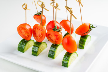 veggie appetizers on the white plate