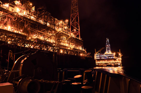 FPSO tanker vessel near Oil platform Rig. Offshore oil and gas industry, sea oil production and storage.