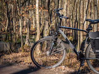 Fototapeta premium Bicycle on the trail in the forest, autumn season.