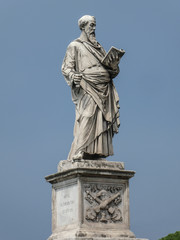 Obraz premium Statue of the apostle St. Paul holding a broken sword and a book with the pedestal inscription Borgo, on Ponte Sant'Angelo, Rome, Italy. The sculpture was by the Italian early Renaissance Paolo Romano