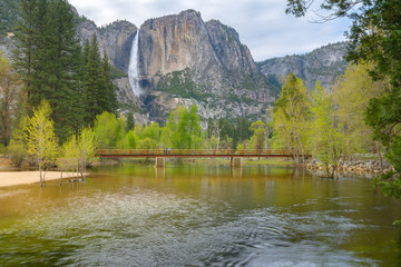 Yosemite waterfalls reflected in Merced river, Yosemite National Park, California, USA