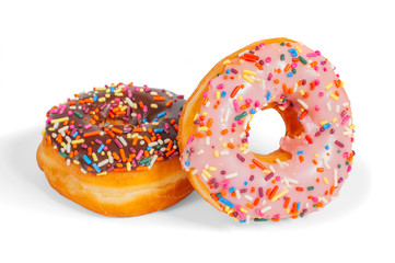 Colorful glazed donuts on white background.