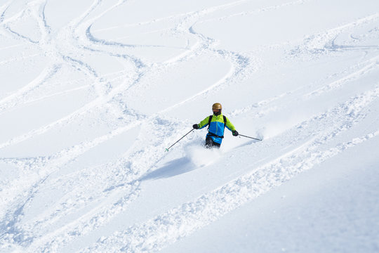 Telemark skiing on powder slope with few ski tracks in Hokkaido
