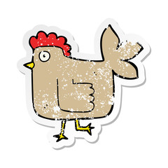 distressed sticker of a cartoon chicken