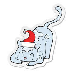 sticker of a cartoon cat wearing christmas hat
