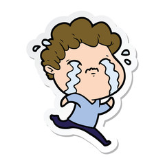 sticker of a cartoon man crying