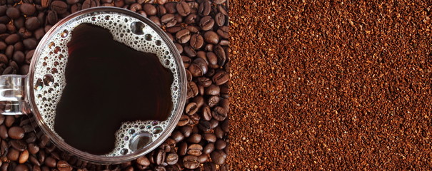 coffee cup with dark roasted coffee beans and ground coffee powder closeup top view