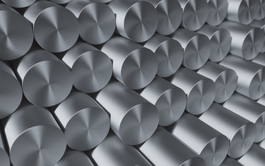 Close-up set of metal round kernels and bars. Industrial metallic background