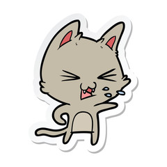 sticker of a cartoon cat hissing