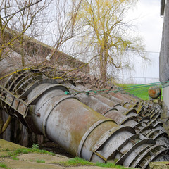 Outlet pipes of a water pumping station. Pipes of large diameter