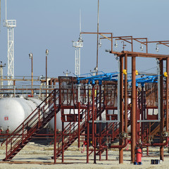 Overpass loading of oil products and fuel storage vessels