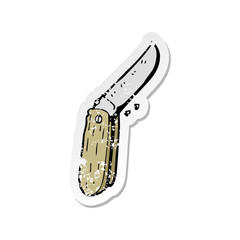 retro distressed sticker of a cartoon folding knife
