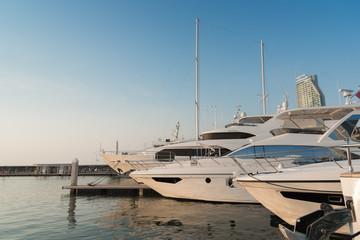 Fototapeta premium View of Harbor and marina with moored yachts and motorboats in pattaya thailand