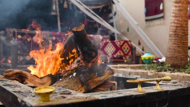 Campfire in Bedouin house where tea or Arabic coffee are prepared.