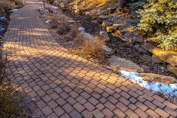 Fototapeta na wymiar Curvy brick pathway on a park in Provo Utah
