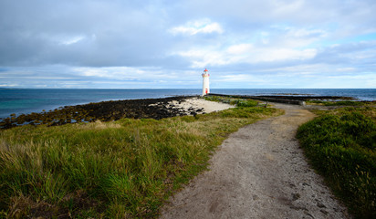 Path leading down to lighthouse on the coast at Port Fairy Victoria Australia