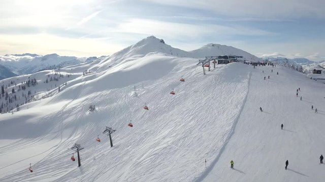 People on Wintersport in Flachau, Austria. Beautiful Drone Shot of the Slopes
