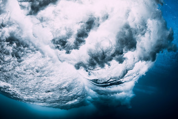 Ocean wave underwater. Blue ocean in underwater