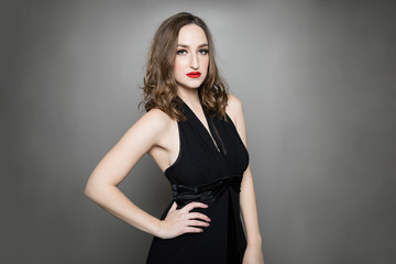 Woman with hand on hip