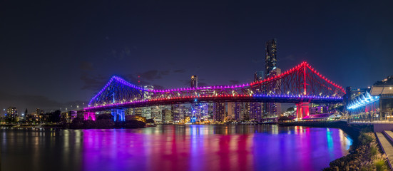Beautiful Story bridge illuminated in front of the CBD at night
