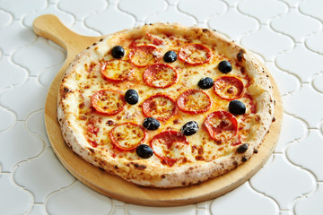 Pepperoni and olive pizza