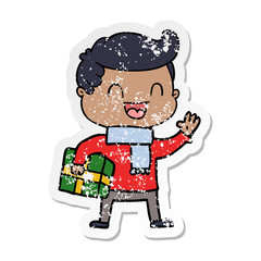 distressed sticker of a cartoon laughing man holding gift