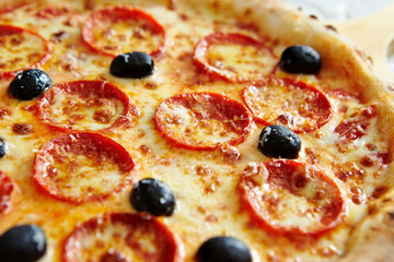 Pepperoni and olive pizza