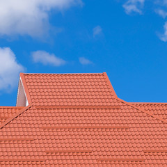 The roof of corrugated sheet red orange