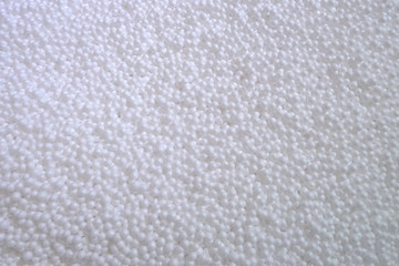 Closeup top view of white pile foam beads