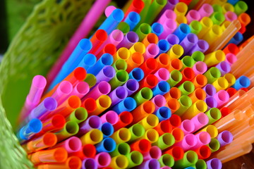 Top view and closeup of bright colorful straws