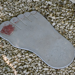 Tile in the form foot of  person