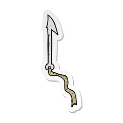 sticker of a cartoon harpoon