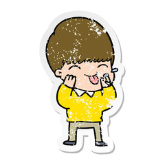 distressed sticker of a cartoon boy blowing raspberry