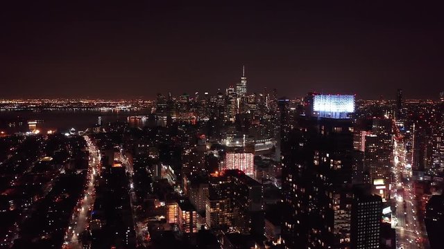 Night Drone Footage of the New York City Skyline.  The footage is taken from Brooklyn, NYC and shows the Lower Manhattan city skyline including the Freedom Tower!