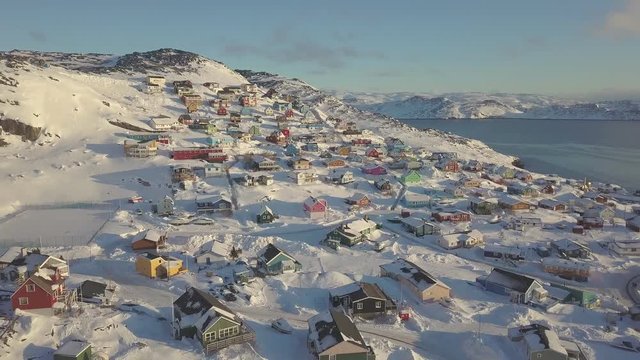 Snow town, colorful village in Covered with snow time aerial view , qaqortoq south greenland europe