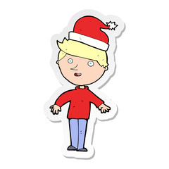 sticker of a cartoon boy in santa hat