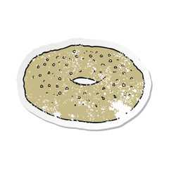 retro distressed sticker of a cartoon bagel
