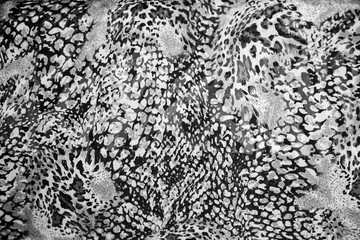 Snake textured print on the fashion material. Trends of the year.