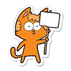 sticker of a happy cartoon cat with sign