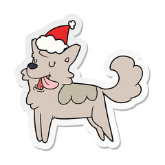 sticker cartoon of a happy dog wearing santa hat