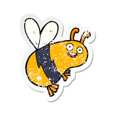 retro distressed sticker of a funny cartoon bee