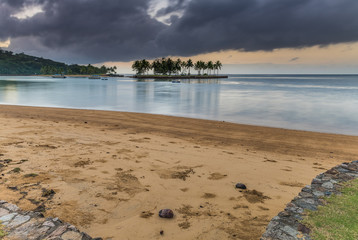 Tropical Sunrise with Island and Palm Trees