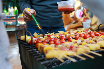 Barbeque Grill Street Food in thailand,Eat outdoors in a happy family.